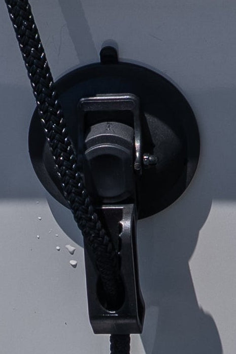 Moveable suction cup dock line holder