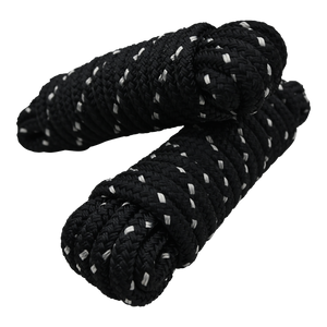 Angled view of two stacked black dock lines with white accents, coiled and secured with looped ends.