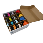 Open box of Seipel Marine cleaners, arranged with four spray bottles and colorful plush towels in divided compartments.