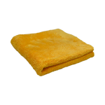 Angled view of the Plush Detailing Towel in yellow, folded with a soft, fluffy texture.