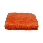 Front view of the Plush Detailing Towel in orange, showing its plush, high-absorbency fabric.
