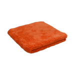 Angled view of the Plush Detailing Towel in orange, folded with a dense microfiber texture.