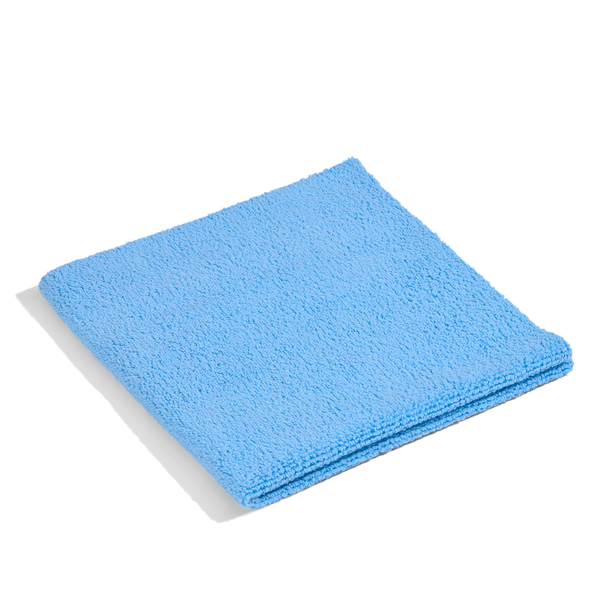 Folded blue towel.
